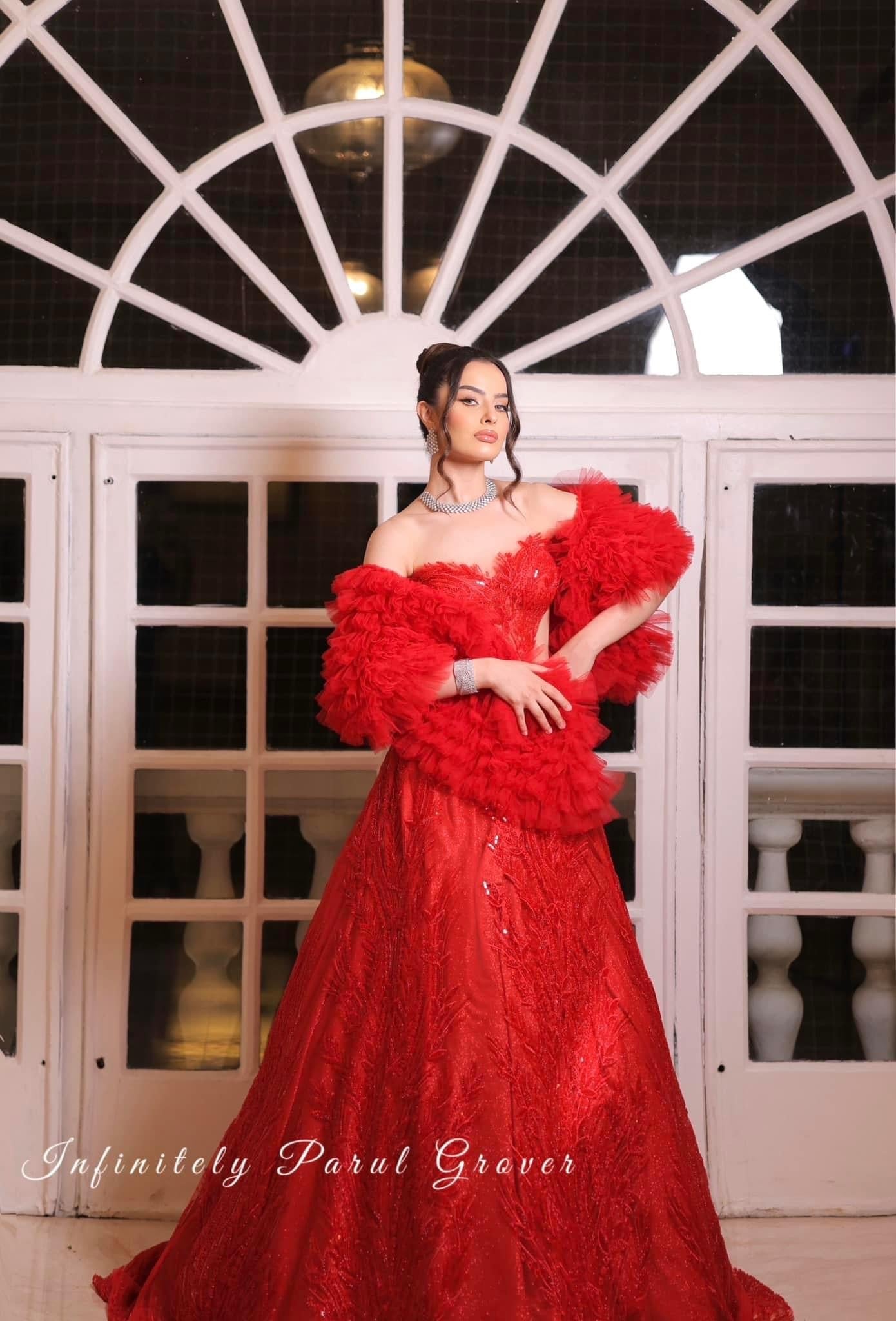 Venetian Red Gown with a Ruffled Cape